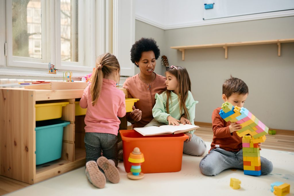 How to Find Quality Child Care. Group of kids playing with child care provider